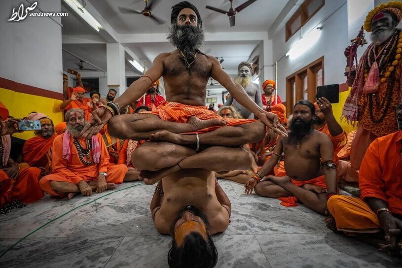 عکس / تمرینات بدنی راهبان هندو در روز جهانی یوگا در گواهاتی هند