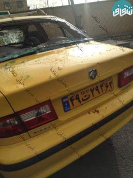 تصاویر/ حمله به تاکسی حامل مطهری
