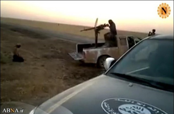 عکس/ داعش با دوشکا اعدام می کند