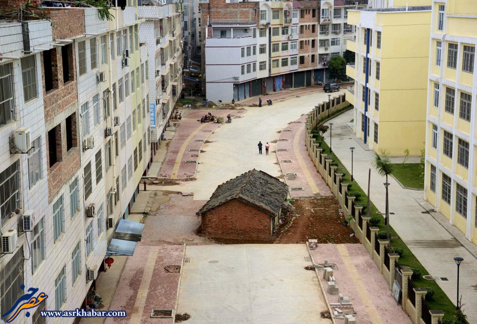 عکس/ وقتی صاحبخانه با شهرداری همکاری نمیکند! عکس/ وقتی صاحبخانه با شهرداری همکاری نمیکند!