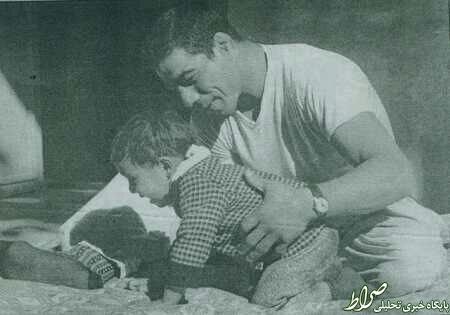 تصویری قدیمی از تختی همراه با فرزندش