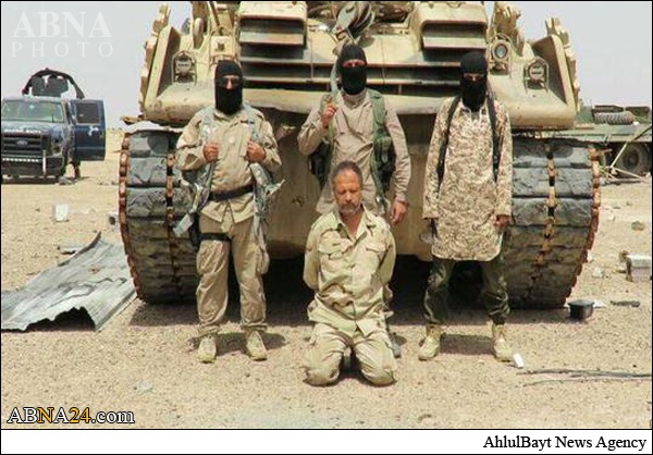 ذبح رزمنده نجفی به دست داعش +عکس