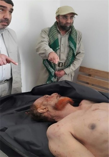 عکس/ سردارایرانی بالای سر جنازه الدوری عکس/ سردارایرانی بالای سر جنازه الدوری