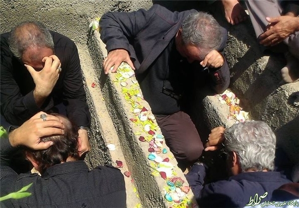 مجیدی و درویش در قبر ۲ شهید +عکس