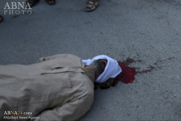 اعدام یک‌پیرمرد توسط جلادداعش+عکس