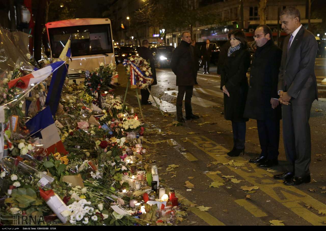 عکس/ ادای احترام اوباما به جانباختگان پاریس