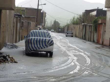 عکس/ بارش شدید تگرگ در هرسین