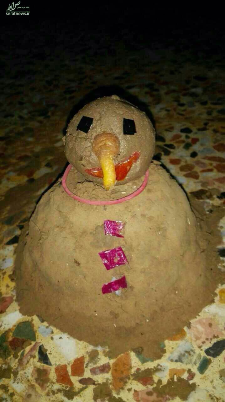 عکس/ ساخت آدم خاكي در اهواز بجاي آدم برفي!