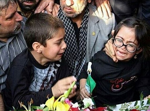 وداع دردناک فرزندان شهید مدافع حرم +عکس