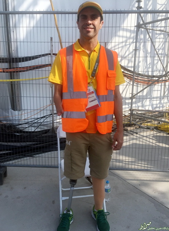 عکس/ یک داوطلب کمک معلول در المپیک عکس/ یک داوطلب کمک معلول در المپیک