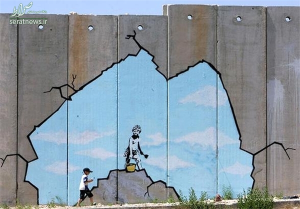 نقاشی بنکسی بر روی دیوار حائل غزه +عکس
