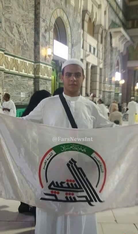 عکس/ اهتزاز پرچم الحشدالشعبی در جوار کعبه