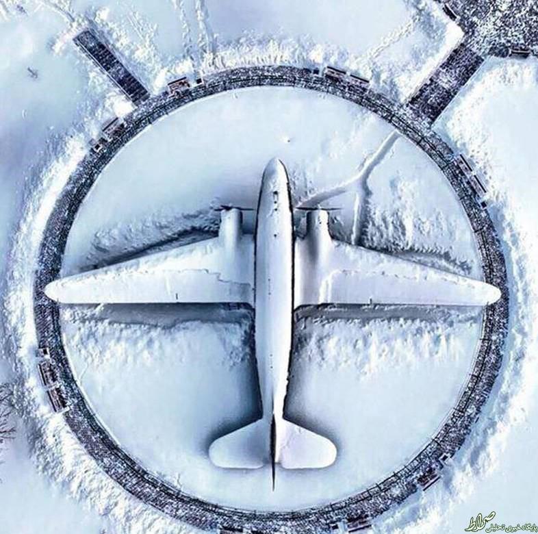عکس جالب از یک روز برفی در فرودگاه عکس جالب از یک روز برفی در فرودگاه