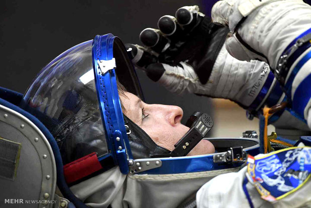 عکس/فضانورد آماده سفر به فضا