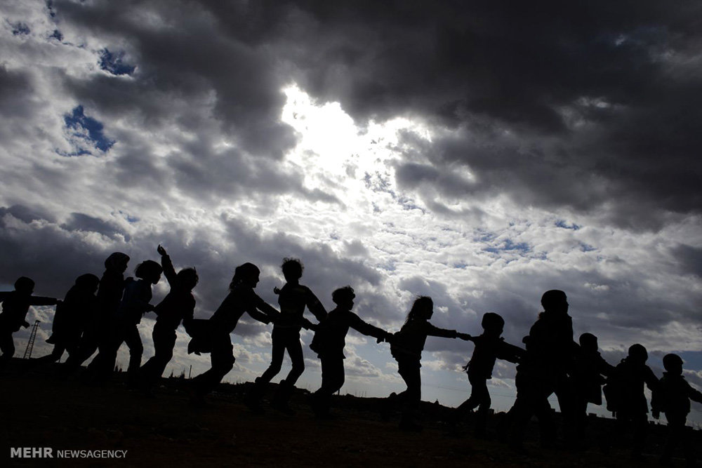 عکس/بازی کردن کودکان آواره در سوریه