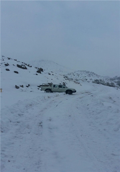 جدال امدادگران برای نجات مادران باردار در کولاک+تصاویر