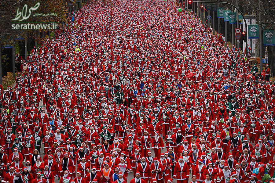 عکس/ مسابقه دو بابانوئل ها در مادرید عکس/ مسابقه دو بابانوئل ها در مادرید