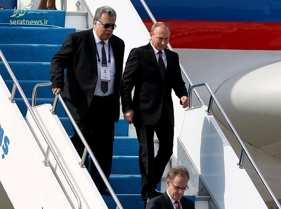 عکس/ سفیر ترورشده در کنار پوتین