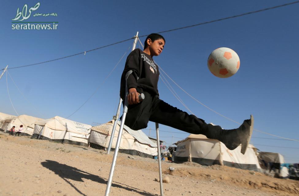عکس/صحنه ای جالب از پسر مهاجر عراقی