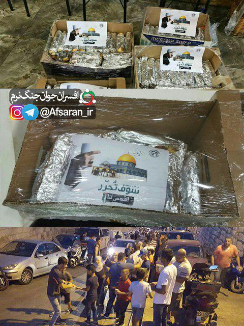 عکس/ توزیع بسته‌های غذایی با جمله 