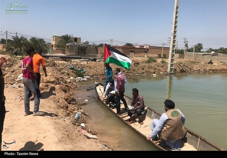 طلاب آفریقایی در مناطق سیل‌زده خوزستان‌ +تصاویر‌