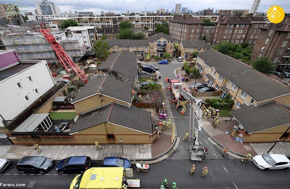 عکس/ سقوط جرثقیل ساختمانی روی خانه‌ها در لندن