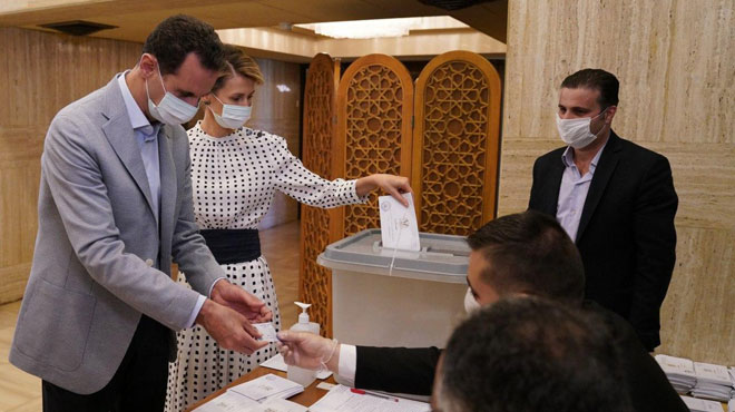 بشار اسد رای خود را به صندوق انداخت+ تصاویر