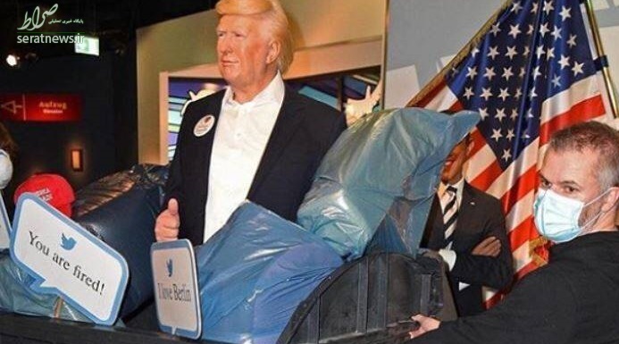 عکس/ مجسمه ترامپ داخل سطل زباله