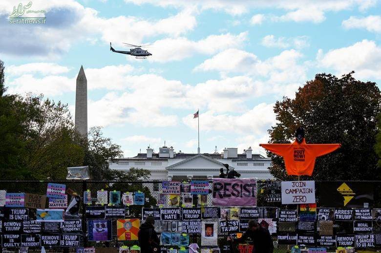 عکس/ نصب پوسترهایی علیه ترامپ روی نرده های کاخ سفید