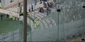 فیلم/پرتاب نارنجک و مصدومیت یک مامور در ورزشگاه آزادی