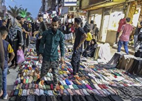 تصاویر/ بازار داغ دستفروش‌ها در آستانه سال نو