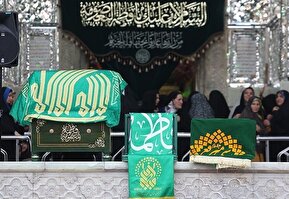آیین تعویض پرچم گنبد حرم حضرت معصومه (س)