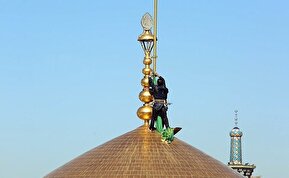 تصاویر/ آئین تعویض پرچم حرم مطهر رضوی