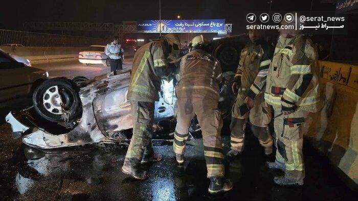 آتش سوزی پژو 206 در جاده تهران - قم +عکس