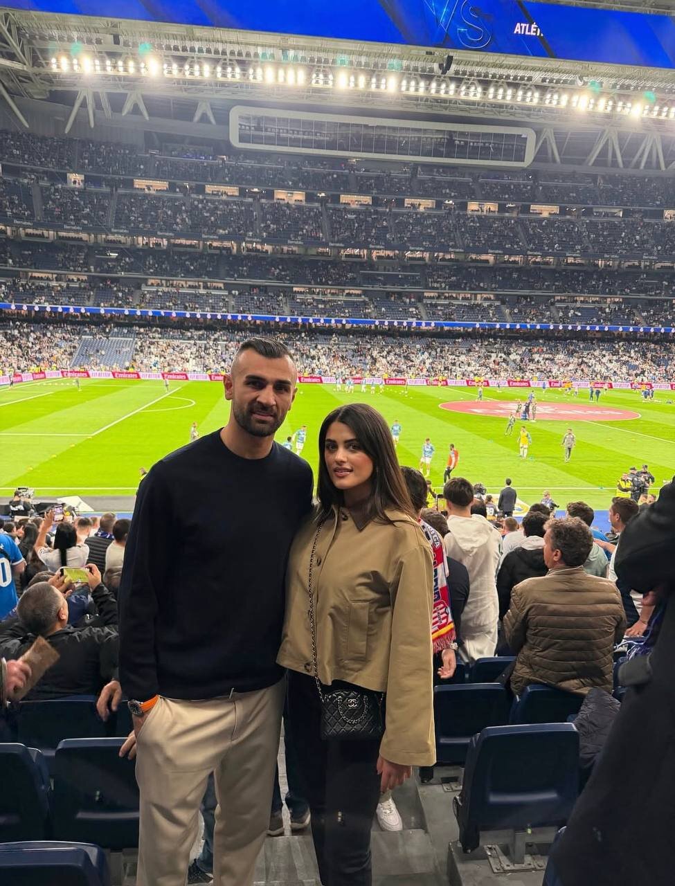 عکس | ستاره پرسپولیسی و همسرش در مادرید؛ تماشای برد رئال در برنابئو