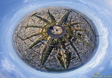 پاریس/
عکاس سعی کرده تا از زاویه خاصی عکسی از طاق پیروزی تهیه کند.