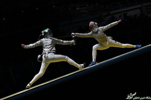 هونگ کوک هیون اهل کره شمالی در حال رقابت با پیر دوپرا فرانسوی.