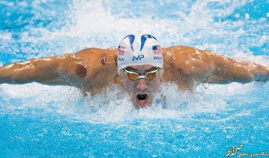 مایکل فلپس در جریان رقابت های شنا 200 متر پروانه.