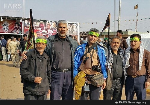  شهید مدافع حرم جواد دوربین (نفر دوم از سمت چپ تصویر)