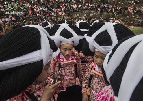 دختران قوم مایو در جریان برگزاری جشنواره گل در چین