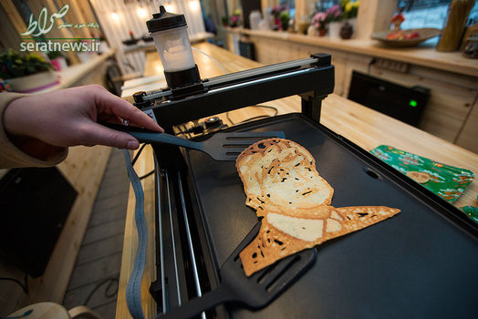 تهیه کلوچه با تصویر دونالد ترامپ رییس جمهور آمریکا در جشن ماسلنیتسای روسیه