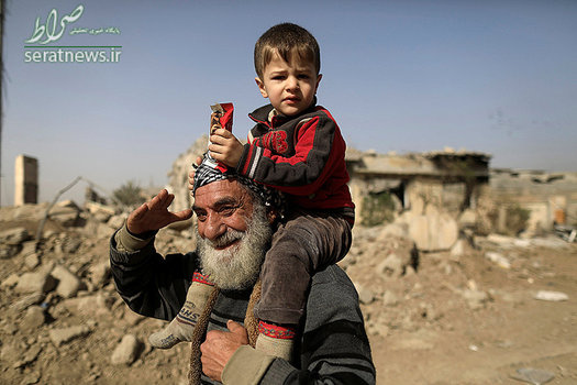 کودک و پیرمرد عراقی آواره شده از موصل