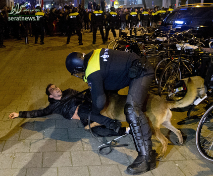 انداختن سگ به جان طرفداران اردوغان در مقابل کنسولگری ترکیه در روتردام هلند