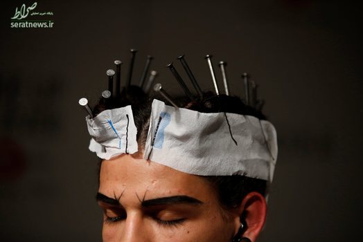 یک مدل با میخهایی در سر در هفته مد لیسبون