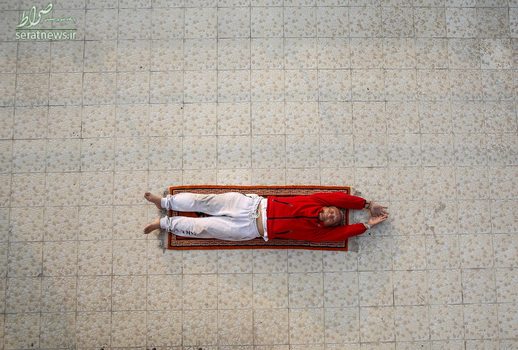 یک مرد 80 ساله در کاتماندوی نپال در حال تمرین صبحگاهی برای آماده شدن به صعود به قله اورست