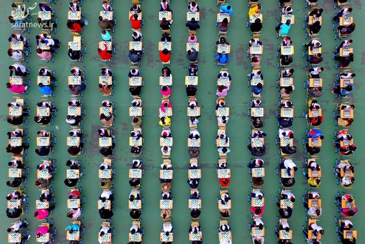 تصویری هوایی از یک رقابت شطرنج بین دانش آموزان و والدینشان در یک مدرسه ابتدایی - لیائونینگ، چین