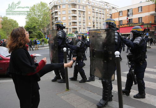 لگدپراکنی یک زن به سوی نیروهای پلیس ضد شورش فرانسه