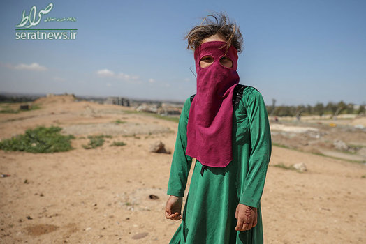 پوشش یک دختر عراقی نزدیک خانه اش در شرق موصل
