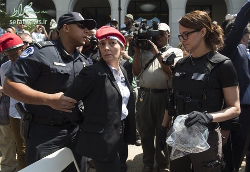 بازداشت یک زن مقابل کاپیتول هیل آمریکا در تجمع سالانه ترویج ماری جوآنا