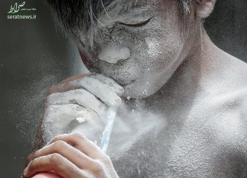 یک پسر فیلیپینی شرکت کننده در جشن سنت ریتا